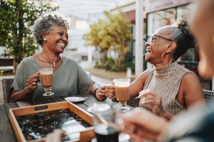 Older adults enjoying time together in a senior living community